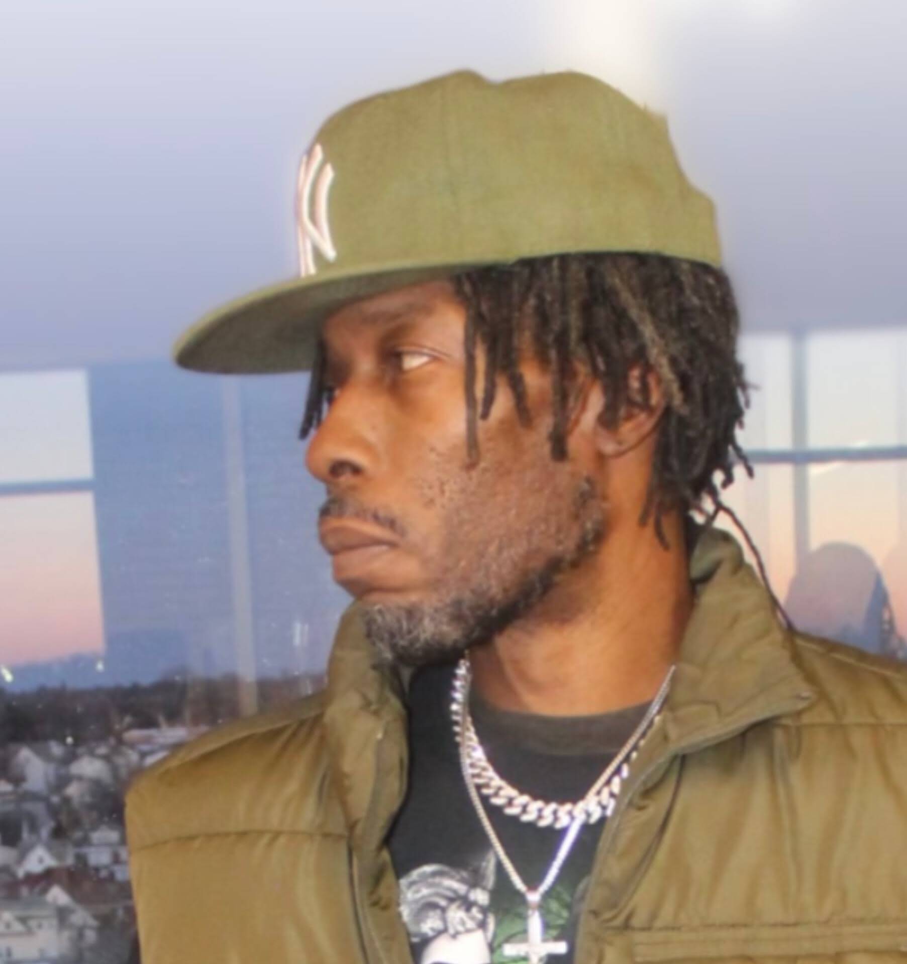 MINDBENDA in profile against a New York dusk skyline